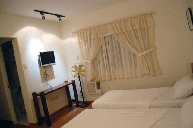 Ilocos Rosewell Hotel Room photo